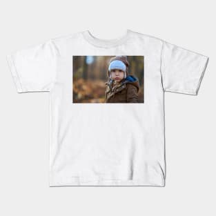 Little boy in the forest Kids T-Shirt